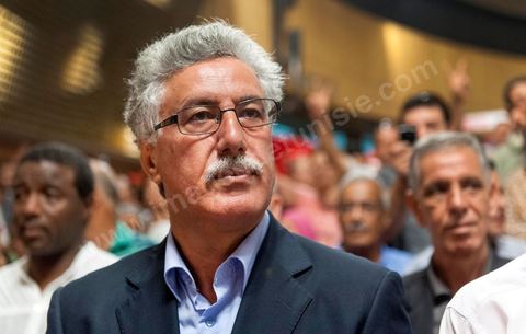 October 7, 2012: Hamma Hammami attended the major inaugural rally this Sunday to launch the Popular Front, the left-wing political party created following the unification of about ten left-wing parties under the leadership of figures such as Hamma Hammami and Chokri Belaïd.  “The Popular Front is the best alternative to govern the country during the next phase and achieve the goals of the revolution, thanks to its clear platform and high level of expertise,” stated Hamma Hammami, Secretary-General of the Tunisian Labor Party, who will be the Popular Front’s presidential candidate. “The Front will enter the upcoming elections armed with an effective monetary, fiscal, and social approach and real solutions to all the problems facing the Tunisian people.”