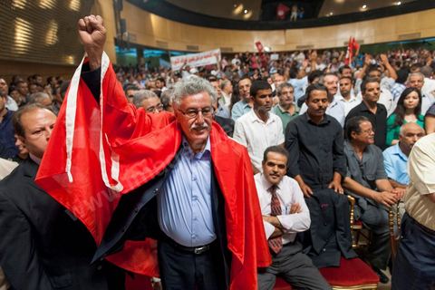 October 7, 2012: Hamma Hammami attended the major inaugural rally this Sunday to launch the Popular Front, the left-wing political party created following the unification of about ten left-wing parties under the leadership of figures such as Hamma Hammami and Chokri Belaïd.  “The Popular Front is the best alternative to govern the country during the next phase and achieve the goals of the revolution, thanks to its clear platform and high level of expertise,” stated Hamma Hammami, Secretary-General of the Tunisian Labor Party, who will be the Popular Front’s presidential candidate. “The Front will enter the upcoming elections armed with an effective monetary, fiscal, and social approach and real solutions to all the problems facing the Tunisian people.”