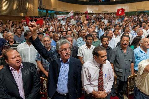 October 7, 2012: Hamma Hammami attended the major inaugural rally this Sunday to launch the Popular Front, the left-wing political party created following the unification of about ten left-wing parties under the leadership of figures such as Hamma Hammami and Chokri Belaïd.  “The Popular Front is the best alternative to govern the country during the next phase and achieve the goals of the revolution, thanks to its clear platform and high level of expertise,” stated Hamma Hammami, Secretary-General of the Tunisian Labor Party, who will be the Popular Front’s presidential candidate. “The Front will enter the upcoming elections armed with an effective monetary, fiscal, and social approach and real solutions to all the problems facing the Tunisian people.”