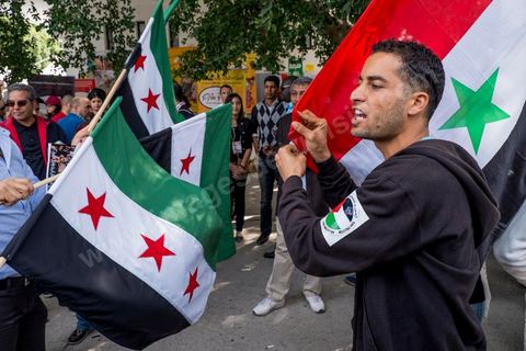 March 29, 2013: A highly tense standoff and minor clashes between pro-rebellion Syrians (flying the three-red-star flag) and Tunisian activists from the Bass Party, which supports Bashar al-Assad, took place in the central square of the WSF on the final day of the World Social Forum meetings on the Tunis university campus. This first forum held in the Arab world was strongly marked by Arab nationalist demands and statements, and dominated by a constant tribute to and support for the Palestinian people.