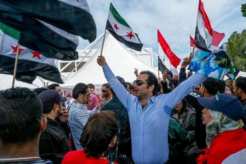 March 29, 2013: A highly tense standoff and minor clashes between pro-rebellion Syrians (flying the three-red-star flag) and Tunisian activists from the Bass Party, which supports Bashar al-Assad, took place in the central square of the WSF on the final day of the World Social Forum meetings on the Tunis university campus. This first forum held in the Arab world was strongly marked by Arab nationalist demands and statements, and dominated by a constant tribute to and support for the Palestinian people.