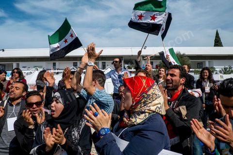March 29, 2013: A highly tense standoff and minor clashes between pro-rebellion Syrians (flying the three-red-star flag) and Tunisian activists from the Bass Party, which supports Bashar al-Assad, took place in the central square of the WSF on the final day of the World Social Forum meetings on the Tunis university campus. This first forum held in the Arab world was strongly marked by Arab nationalist demands and statements, and dominated by a constant tribute to and support for the Palestinian people.