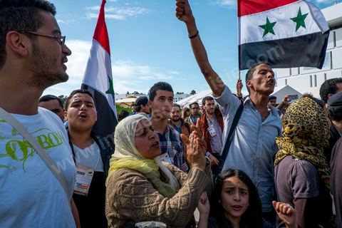March 29, 2013: A highly tense standoff and minor clashes between pro-rebellion Syrians (flying the three-red-star flag) and Tunisian activists from the Bass Party, which supports Bashar al-Assad, took place in the central square of the WSF on the final day of the World Social Forum meetings on the Tunis university campus. This first forum held in the Arab world was strongly marked by Arab nationalist demands and statements, and dominated by a constant tribute to and support for the Palestinian people.