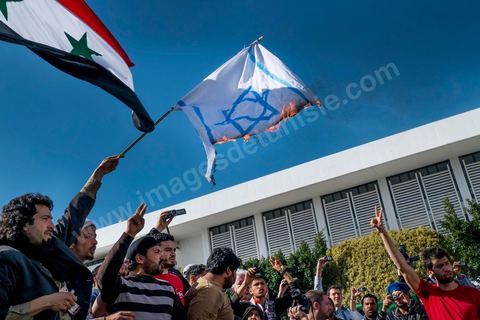 March 29, 2013: Tunisian activists from the “Bass pro Bashar al-Assad” party burned the Israeli flag in the central square of the World Social Forum on the final day of the World Social Forum meetings on the Tunis university campus. This first forum held in the Arab world was strongly marked by Arab nationalist demands and statements, and dominated by a constant tribute to and support for the Palestinian people.