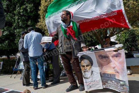 March 29, 2013: Pro-Khomeini activists on the final day of the World Social Forum on the Tunis university campus. This first forum held in the Arab world was strongly marked by Arab nationalist demands and observations, and dominated by a constant tribute to and support for the Palestinian people.