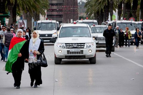 March 30, 2013: Police containment measures to protect protesters during the closing march of the WSF in Tunis