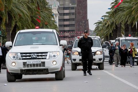 March 30, 2013: Police containment measures to protect protesters during the closing march of the WSF in Tunis