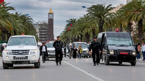 March 30, 2013: Police containment measures to protect protesters during the closing march of the WSF in Tunis
