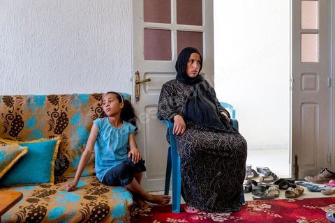 June 14: The wife and daughter of Mokhtar Mbarki, the soldier killed by his comrades during a nighttime sweep operation in Mount Chambi in Kasserine.