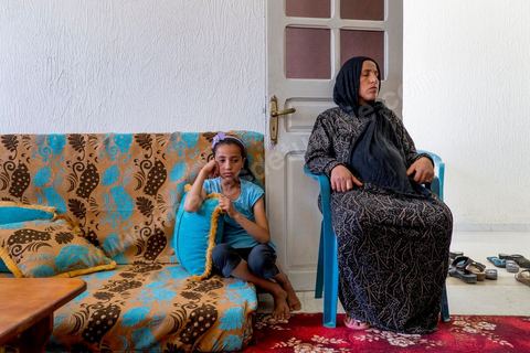 June 14: The wife and daughter of Mokhtar Mbarki, the soldier killed by his comrades during a nighttime sweep operation in Mount Chambi in Kasserine.