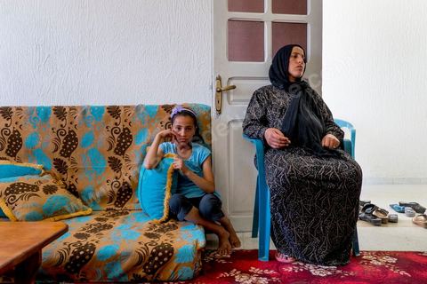 June 14: The wife and daughter of Mokhtar Mbarki, the soldier killed by his comrades during a nighttime sweep operation in Mount Chambi in Kasserine.