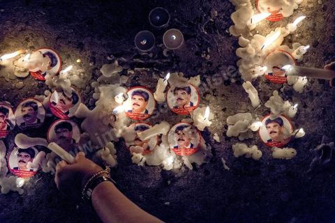 July 31, 2013: A candle in memory of the martyr Mohamed Brahim, who was assassinated on July 25. For the past four evenings, Tunisians have been gathering in the square in front of the National Assembly in the Bardo district of Tunis. Surrounding the nightly sit-ins held by striking members of parliament, the public has been gathering to express their outrage over the assassination of MP Mohamed Brahmi and eight soldiers at Jebel Chambi.