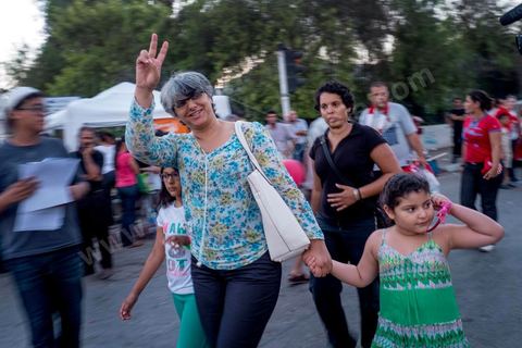 August 6, 2013: Basma Khalfaoui, widow of Chokri Belaid, arrived with her daughters at the mass rally organized by lawmakers staging a sit-in for a large evening event in tribute to the martyrs. On this evening marking the six-month anniversary of Chokri Belaid’s assassination, nearly 60,000 opponents of the regime gathered.