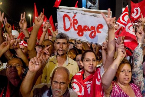 August 6, 2013: The 2013 version of the “Get out!” chant during the massive rally in support of the lawmakers staging a sit-in, held as part of a grand evening event honoring the martyrs. On this evening marking the six-month anniversary of Chokri Belaid’s assassination, nearly 60,000 opponents of the regime gathered.