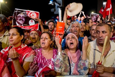 August 6, 2013: People of all generations were deeply moved during the prayer for the martyrs at the mass rally held in support of the lawmakers on sit-in, as part of a grand evening tribute to the martyrs. On this evening marking the six-month anniversary of Chokri Belaid’s assassination, nearly 60,000 opponents of the regime gathered.
