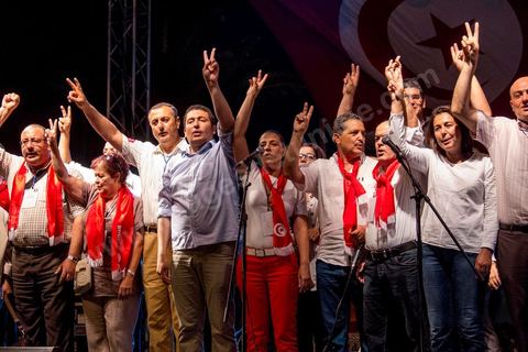 August 24, 2013: Striking lawmakers sing the Tunisian national anthem at the lawmakers’ sit-in at the Bardo, The Tunisian opposition, united in a diverse coalition ranging from the far left to the center-right, mobilized nearly 7,000 of its supporters in Tunis to launch its “Week of Departure,” which aims to force, through peaceful demonstrations, the Ennahda-led government to resign following a month-long political deadlock triggered by the assassination of an opposition figure. 
