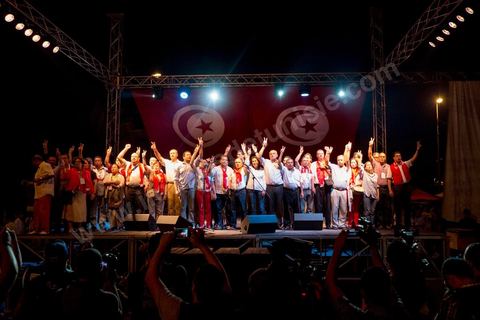 August 24, 2013: Striking lawmakers sing the Tunisian national anthem at the lawmakers’ sit-in at the Bardo, The Tunisian opposition, united in a diverse coalition ranging from the far left to the center-right, mobilized nearly 7,000 of its supporters in Tunis to launch its “Week of Departure,” which aims to force, through peaceful demonstrations, the Ennahda-led government to resign following a month-long political deadlock triggered by the assassination of an opposition figure. 