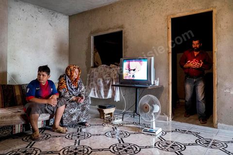 In their living room, Ahmed shows us the many medals won by his missing son, a wrestling champion. At the home of Ahmed and Janet RIHIME in the Kabaria neighborhood. These parents have been searching for their 19-year-old son, Wissem, since March 2011. The tragedy struck this family twice when Janet, the mother, in her despair, set herself on fire a few months ago.