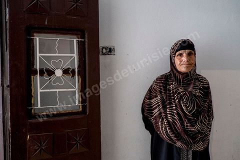 Omelkhir’s grandmother came to live with her daughter to help her. At Omelkhir Ouiretani’s home, this young mother of two is searching for her husband, Nabil, who went missing on the boat on March 29, 2011, in the Kabaria neighborhood.