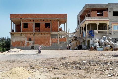 In Kabaria, a working-class neighborhood in the southern suburbs of Tunis, at the home of Nourredine MBAREK, father of Karim, who went missing on March 29, 2011. View of Kabaria from the balcony of Nourredine’s home.