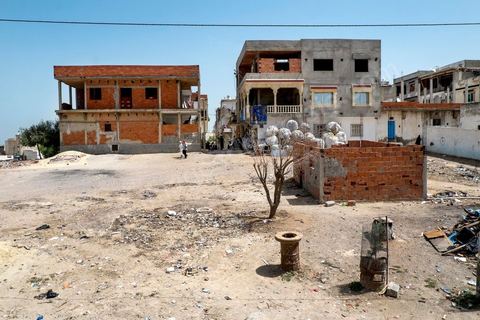In Kabaria, a working-class neighborhood in the southern suburbs of Tunis, at the home of Nourredine MBAREK, father of Karim, who went missing on March 29, 2011. View of Kabaria from the balcony of Nourredine’s home.