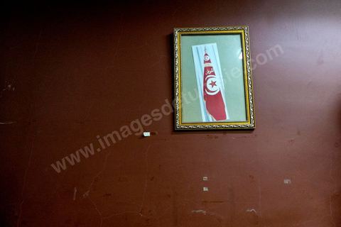 January 16, 2014: In the technical offices of the National Constituent Assembly, an old official portrait of former President Ben Ali …