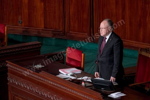 January 14, 2014: President Mustapha Ben Jaafar addresses the National Constituent Assembly, where members continue to review and vote on the articles of the constitution. On the anniversary of the Revolution, the president of the National Constituent Assembly had hoped to finalize the constitution on this commemorative day; unfortunately, heated debates are causing delays. 