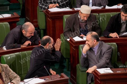 January 14, 2014: Ennahdha representative Ameur Laryedh at the National Constituent Assembly; representatives continue to review and vote on the articles of the constitution. On the anniversary of the Revolution, the president of the National Constituent Assembly had hoped to finalize the constitution on this commemorative day; unfortunately, heated debates are causing delays. 