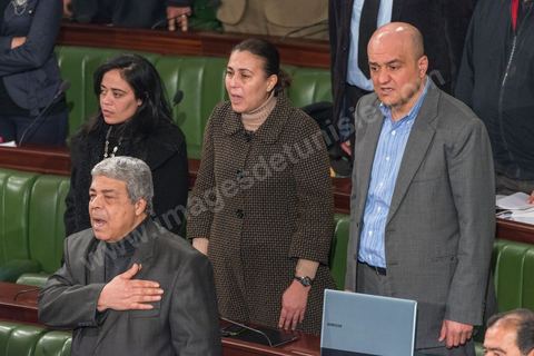 Members of Parliament sing the national anthem on January 14, 2014, to mark the third anniversary of the Revolution (from left to right: Manal Kadri, Mohamed Habib Harguem, Karima Souid, Jamel Gargouri).