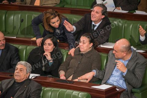 Selim Ben Abdesalem (top) comforts Karima Souid during an incident that occurred during the constitutional debates.