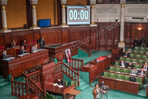The National Constituent Assembly chamber during the constitutional debates. The speaking time allotted to members to defend their amendments is being counted down.