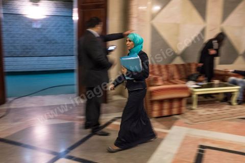 A member of the Constituent Assembly enters the chamber.