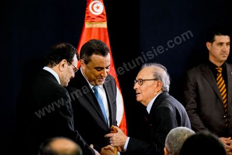 January 29, 2014: Ali Larayedh and Mehdi Jomaa welcoming political figures—here, Ahmed Mestiri—at the handover ceremony between the two governments, led by outgoing Prime Minister Ali Larayedh and new Prime Minister Mehdi Jomaa. All members of the outgoing and incoming governments were present, as well as political party leaders and other political figures. 