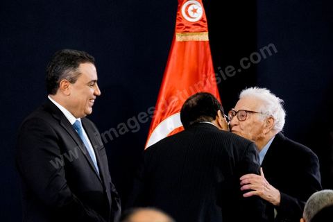 January 29, 2014: Ali Larayedh and Mehdi Jomaa welcoming political figures—here, Mustapha Filali—at the handover ceremony between the two governments, led by outgoing Prime Minister Ali Larayedh and new Prime Minister Mehdi Jomaa. All members of the outgoing and incoming governments were present, as well as political party leaders and other political figures. 