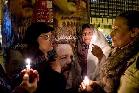 February 6, 2014: That evening, several hundred people gathered on Habib Bourguiba Avenue in downtown Tunis for a candlelight vigil and a concert. Stalls selling buttons, pendants, and photos of the politician were also set up. One year later… commemorations of the assassination of Chokri Belaid, a left-wing opposition figure, took place two days after the announcement of the death of his alleged assassin. The 48-year-old lawyer, a Marxist and pan-Arabist activist and fierce critic of Islamists, was shot and killed on February 6, 2013, outside his home.