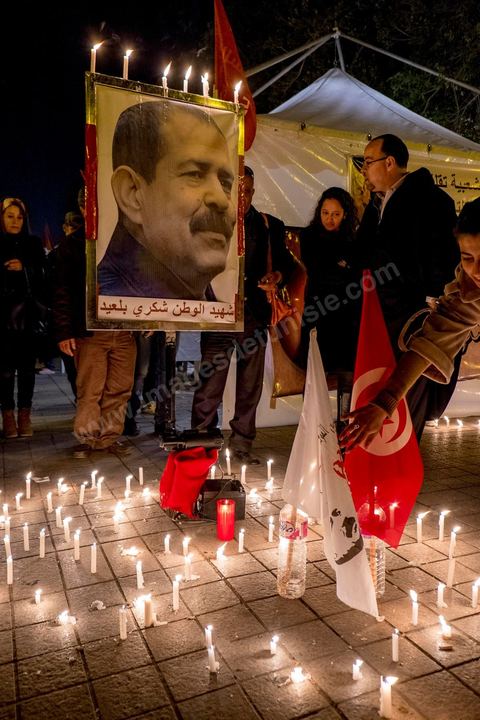 February 6, 2014: That evening, several hundred people gathered on Habib Bourguiba Avenue in downtown Tunis for a candlelight vigil and a concert. Stalls selling buttons, pendants, and photos of the politician were also set up. One year later… commemorations of the assassination of Chokri Belaid, a left-wing opposition figure, took place two days after the announcement of the death of his alleged assassin. The 48-year-old lawyer, a Marxist and pan-Arabist activist and fierce critic of Islamists, was shot and killed on February 6, 2013, outside his home.
