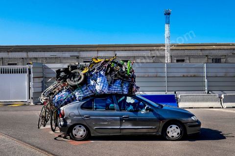 Loading of the overloaded vehicles and the passengers in the port of Marseille. Aboard the new vessel Tanit de la CTN (Tunisian Company of Navigation) going Marseille to Tunis. The return of the Tunisian immigrants in France every summer represents a tourist and financial basket very important for Tunisia. The number of Tunisians of the foreigner would be close to 1,5 millions that is 13 % of the Tunisian population, are 60 % to be lived in France and 82 % in Europe, The summer represents 55 % of the 1,75 million Tunisians' annual entrances of the foreigner.