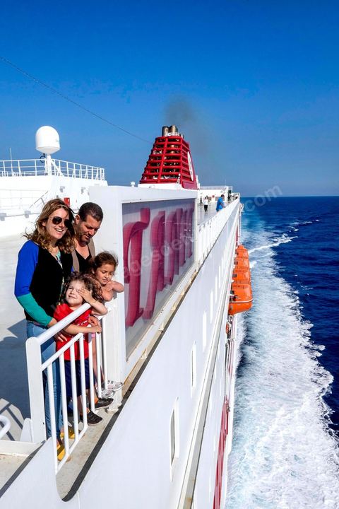 Passengers on the bridge in the approach of Tunisia. Aboard the new vessel Tanit de la CTN (Tunisian Company of Navigation) going Marseille to Tunis. The return of the Tunisian immigrants in France every summer represents a tourist and financial basket very important for Tunisia. The number of Tunisians of the foreigner would be close to 1,5 millions that is 13 % of the Tunisian population, are 60 % to be lived in France and 82 % in Europe, The summer represents 55 % of the 1,75 million Tunisians' annual entrances of the foreigner.