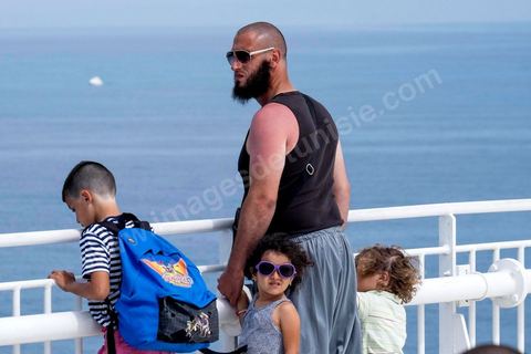 Passengers on the bridge in the approach of Tunisia. Aboard the new vessel Tanit de la CTN (Tunisian Company of Navigation) going Marseille to Tunis. The return of the Tunisian immigrants in France every summer represents a tourist and financial basket very important for Tunisia. The number of Tunisians of the foreigner would be close to 1,5 millions that is 13 % of the Tunisian population, are 60 % to be lived in France and 82 % in Europe, The summer represents 55 % of the 1,75 million Tunisians' annual entrances of the foreigner.