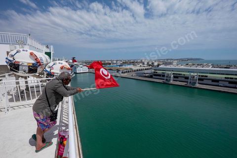 Arrived at the port of Goulette to Tunis. Aboard the new vessel Tanit de la CTN (Tunisian Company of Navigation) going Marseille to Tunis. The return of the Tunisian immigrants in France every summer represents a tourist and financial basket very important for Tunisia. The number of Tunisians of the foreigner would be close to 1,5 millions that is 13 % of the Tunisian population, are 60 % to be lived in France and 82 % in Europe, The summer represents 55 % of the 1,75 million Tunisians' annual entrances of the foreigner.