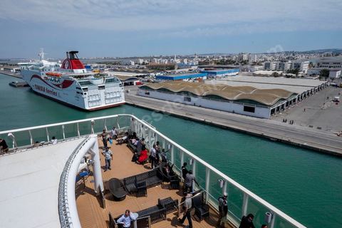 Arrived at the port of Goulette to Tunis. Aboard the new vessel Tanit de la CTN (Tunisian Company of Navigation) going Marseille to Tunis. The return of the Tunisian immigrants in France every summer represents a tourist and financial basket very important for Tunisia. The number of Tunisians of the foreigner would be close to 1,5 millions that is 13 % of the Tunisian population, are 60 % to be lived in France and 82 % in Europe, The summer represents 55 % of the 1,75 million Tunisians' annual entrances of the foreigner.