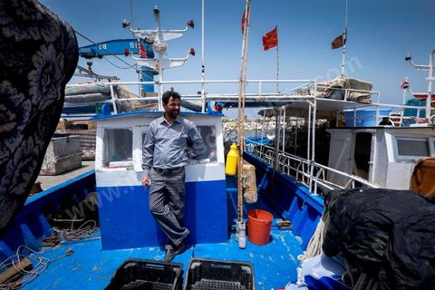 June 24, 2014: Mohamed’s fishing boat in the small port of Ksibet. Mohamed, a fishing boat captain in Ksibet El Mediouni near Monastir, smuggled hundreds of young undocumented migrants between Tunisia and Sicily between 1996 and 2002. Sentenced to six and a half years in prison, he has now returned to his work as a fishing boat captain. 