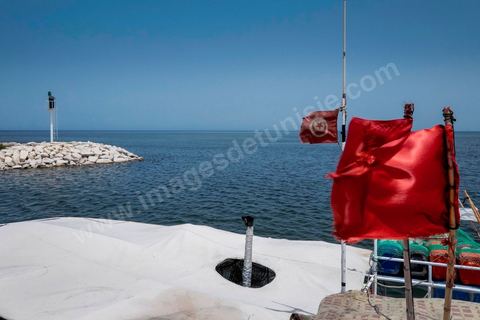 June 24, 2014: Mohamed’s fishing boat in the small port of Ksibet. Mohamed, a fishing boat captain in Ksibet El Mediouni near Monastir, smuggled hundreds of young undocumented migrants between Tunisia and Sicily between 1996 and 2002. Sentenced to six and a half years in prison, he has now returned to his work as a fishing boat captain. 