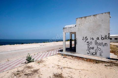 June 24, 2014: Graffiti at the small port of Ksibet. Mohamed, a fishing boat captain in Ksibet El Mediouni near Monastir, smuggled hundreds of young undocumented migrants between Tunisia and Sicily between 1996 and 2002. Sentenced to six and a half years in prison, he has now returned to his work as a fishing boat captain. 