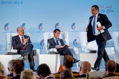 September 8, 2014: Tunisian Prime Minister Mehdi Jomaa stands, while French Prime Minister Manuel Valls and his Algerian counterpart Abdelmalek Sallel (L) sit during the opening of the “Investing in Tunisia, Start-Up Democracy,” organized by Tunisia and France and attended by representatives from numerous countries. During the conference, Tunisia presented 20 major investment projects across several sectors, including new technologies, renewable energy, industry, tourism, and trade.