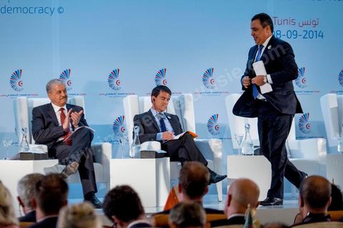 September 8, 2014: Tunisian Prime Minister Mehdi Jomaa stands, while French Prime Minister Manuel Valls and his Algerian counterpart Abdelmalek Sallel (L) sit during the opening of the “Investing in Tunisia, Start-Up Democracy,” organized by Tunisia and France and attended by representatives from numerous countries. During the conference, Tunisia presented 20 major investment projects across several sectors, including new technologies, renewable energy, industry, tourism, and trade.