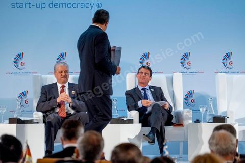 September 8, 2014: Tunisian Prime Minister Mehdi Jomaa stands, while French Prime Minister Manuel Valls and his Algerian counterpart Abdelmalek Sallel (L) sit during the opening of the “Investing in Tunisia, Start-Up Democracy,” organized by Tunisia and France and attended by representatives from numerous countries. During the conference, Tunisia presented 20 major investment projects across several sectors, including new technologies, renewable energy, industry, tourism, and trade.