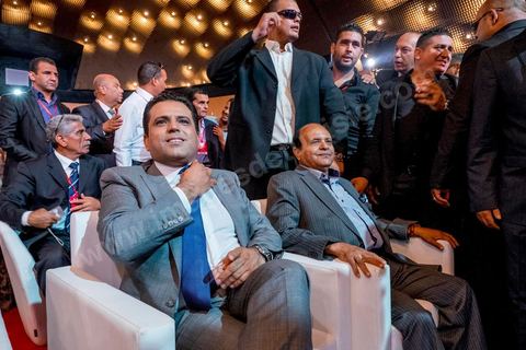 29 septembre 2014 : Slim Riahi et à droite son père. Le président de l'Union patriotique libre (UPL) et son candidat à la présidentielle, Slim Riahi, a présenté les listes de son parti pour les prochaines législatives ainsi que son programme électoral, lors d'une conférence de presse au palais des congrès de Tunis. Slim Riahi s’est attaqué à Nida Tounes et à Ennahdha, l’un parce qu’il fonde sa démarche sur la diabolisation et l’autre pour avoir noué un deal avec les ex-Rcdistes.