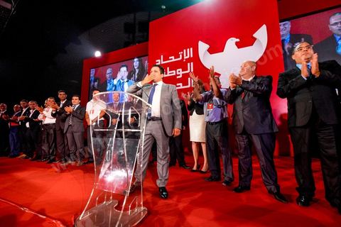 29 septembre 2014 : Slim RIahi entouré de ses têtes de listes aux legislatives. Le président de l'Union patriotique libre (UPL) et son candidat à la présidentielle, Slim Riahi, a présenté les listes de son parti pour les prochaines législatives ainsi que son programme électoral, lors d'une conférence de presse au palais des congrès de Tunis. Slim Riahi s’est attaqué à Nida Tounes et à Ennahdha, l’un parce qu’il fonde sa démarche sur la diabolisation et l’autre pour avoir noué un deal avec les ex-Rcdistes.