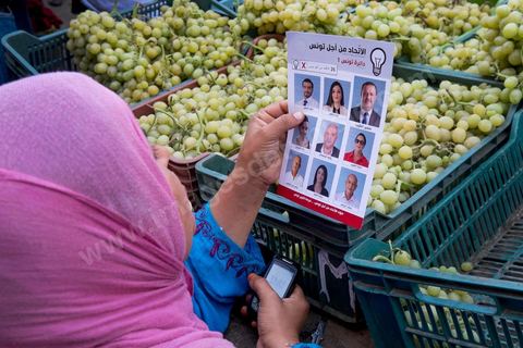 October 16, 2014: Samir Taieb, a member of the National Constituent Assembly (ANC) and the lead candidate on the Tunis 1 list for the Union for Tunisia (UPT) party in the legislative elections, campaigning at the Kabaria market. Kabaria is one of the most disadvantaged neighborhoods in the southern suburbs of Tunis; social tensions and grievances are widespread in these neighborhoods, where residents are often disillusioned with politics. Grassroots outreach has the merit of giving them hope and convincing them to go to the polls. 